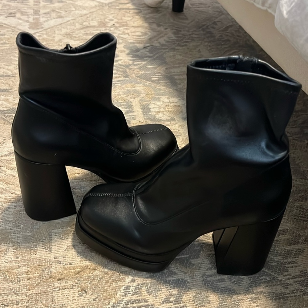 Black skin tight boots.